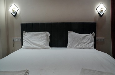 Guest room for Varanasi travellers at SINGH RESIDENCY